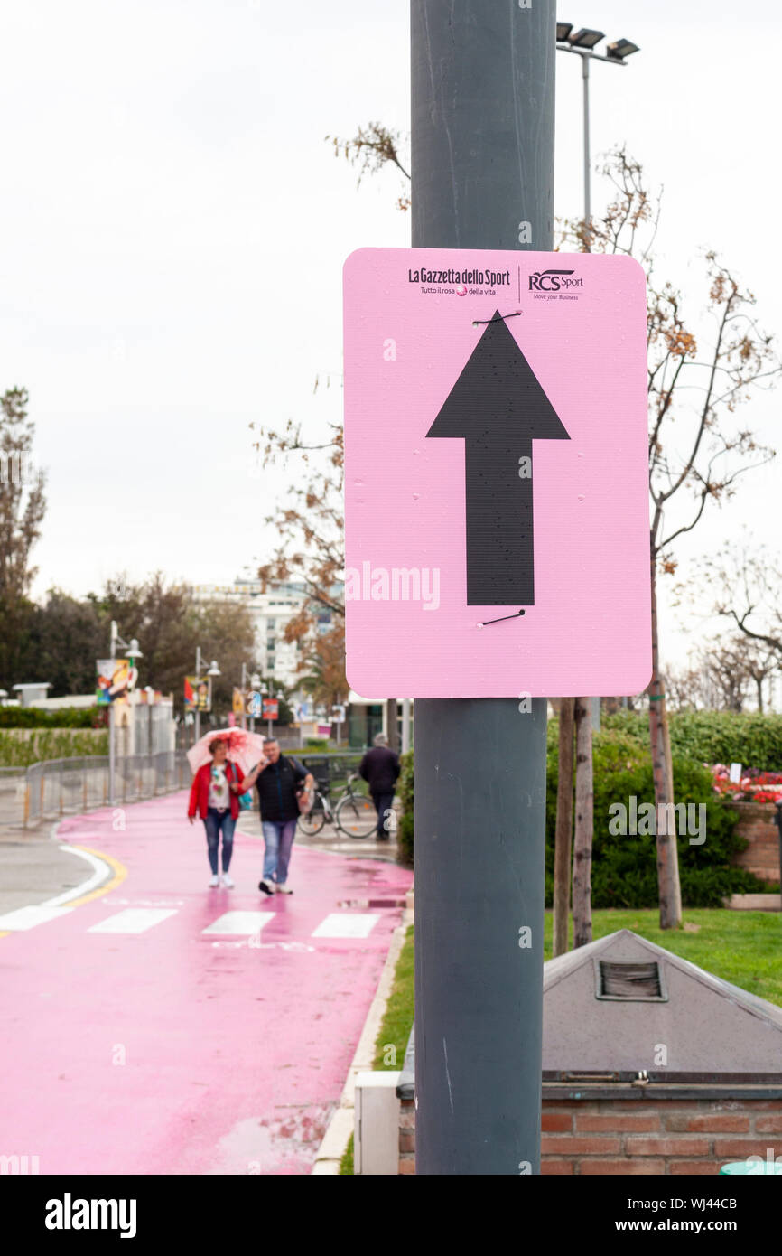 A directional sign on the ITT course for stage 9 of the 2019 Giro d'Italia, in Riccione, Emilia-Romagna Stock Photo