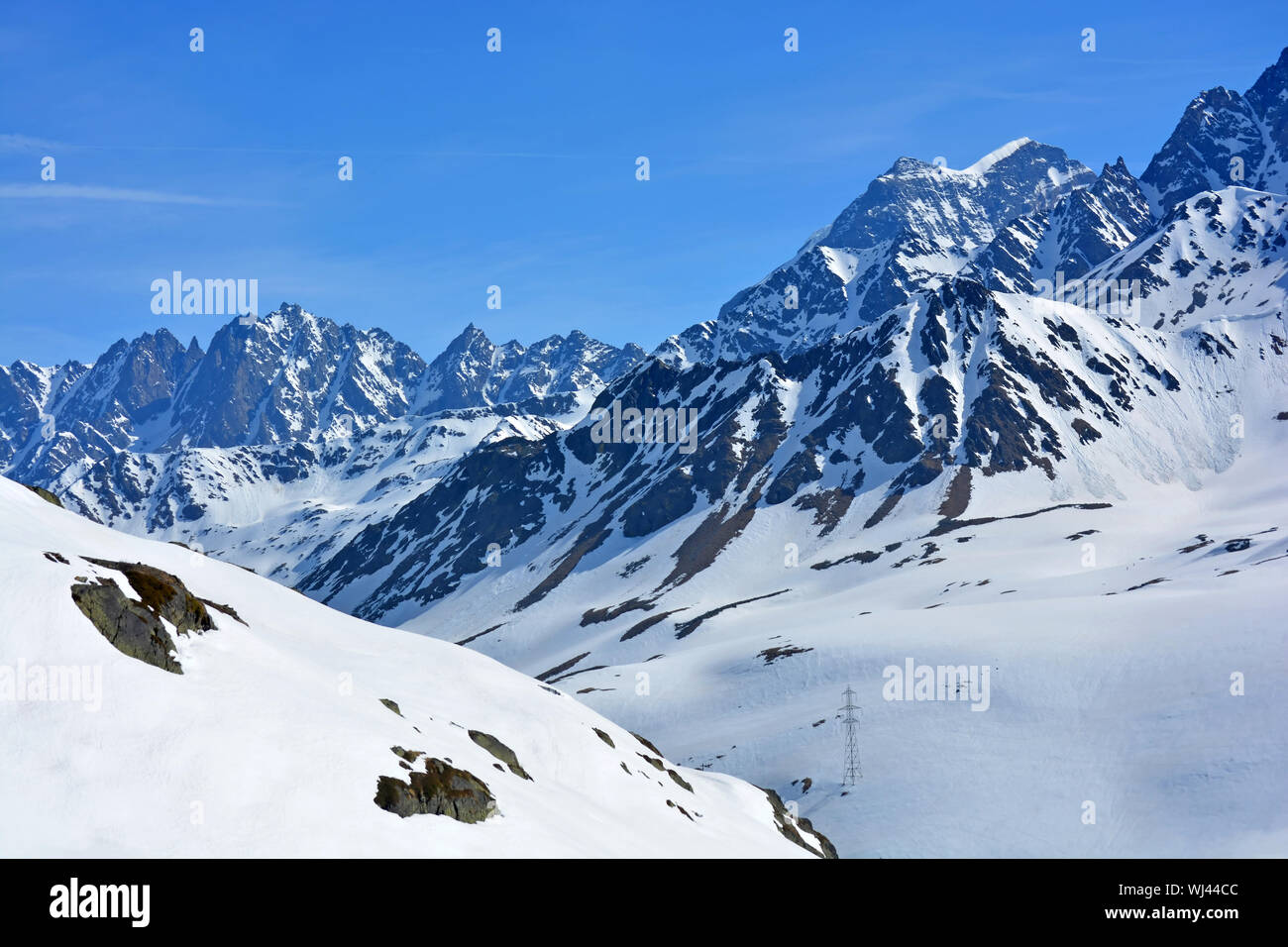 Mt Velan (right) and the Maisons Blanches (centre) in the Swiss Alps as seen from the Great St Bernard Pass Stock Photo