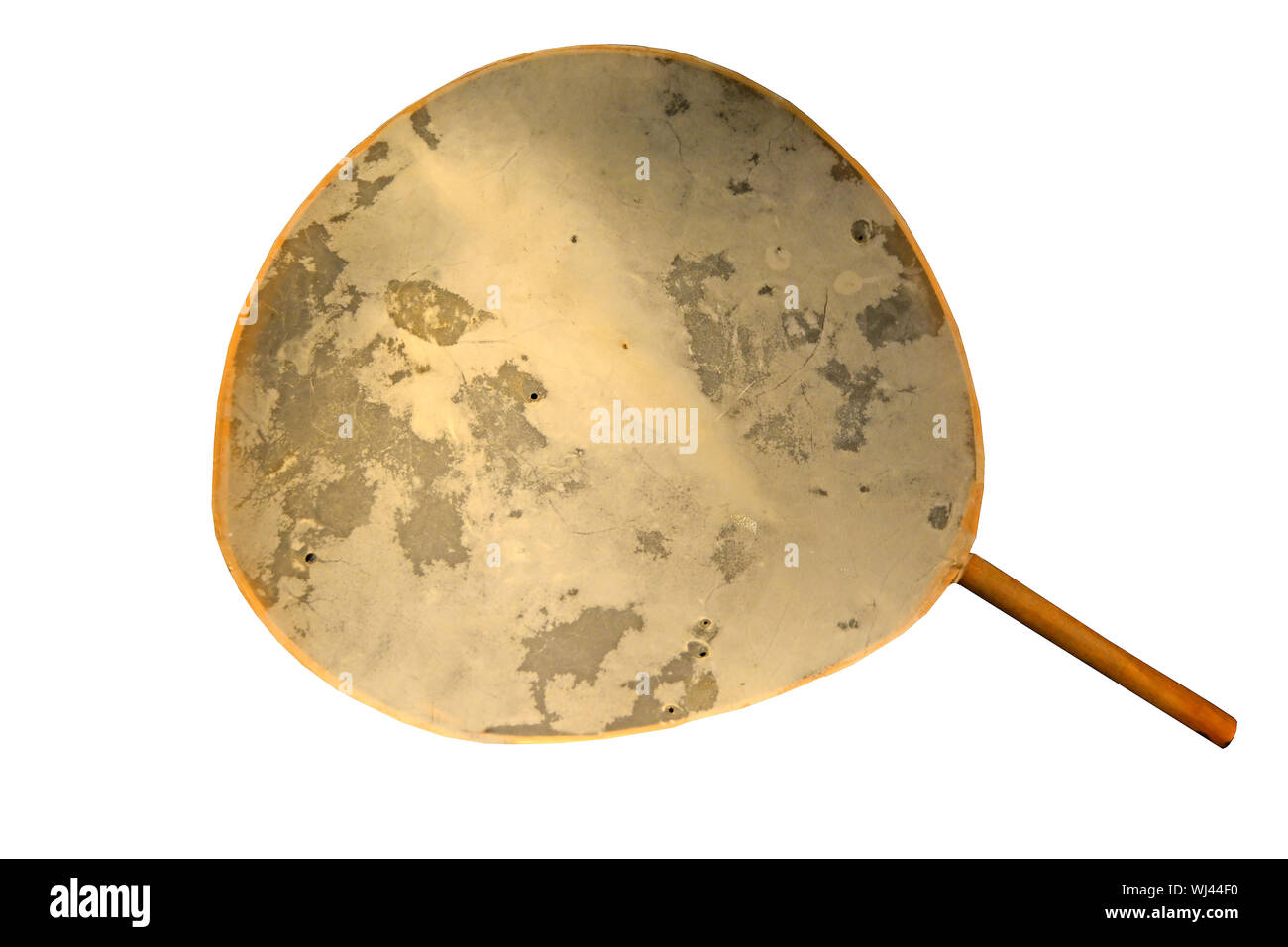 Ice Shamanic Drum made from leather stretched over a thin wooden frame, dating to around 20,000 years ago from Western Europe. Isolated against a whit Stock Photo