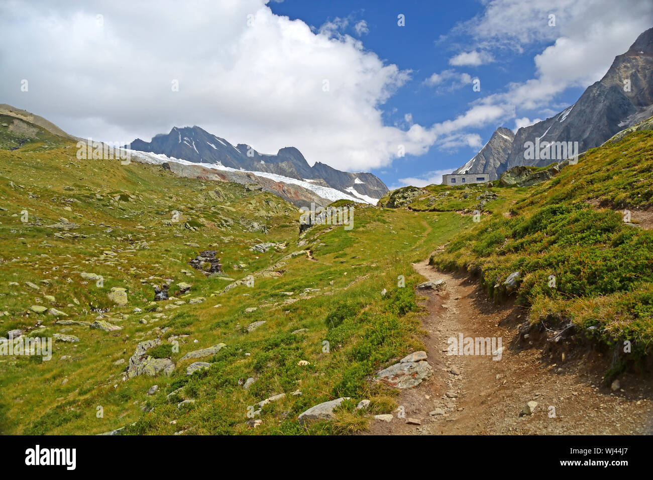 The modern Annenhutte mountain refuge at the head of the Lotschtal in the Swiss Bernese Alps. the Sattelhorn on the right Stock Photo