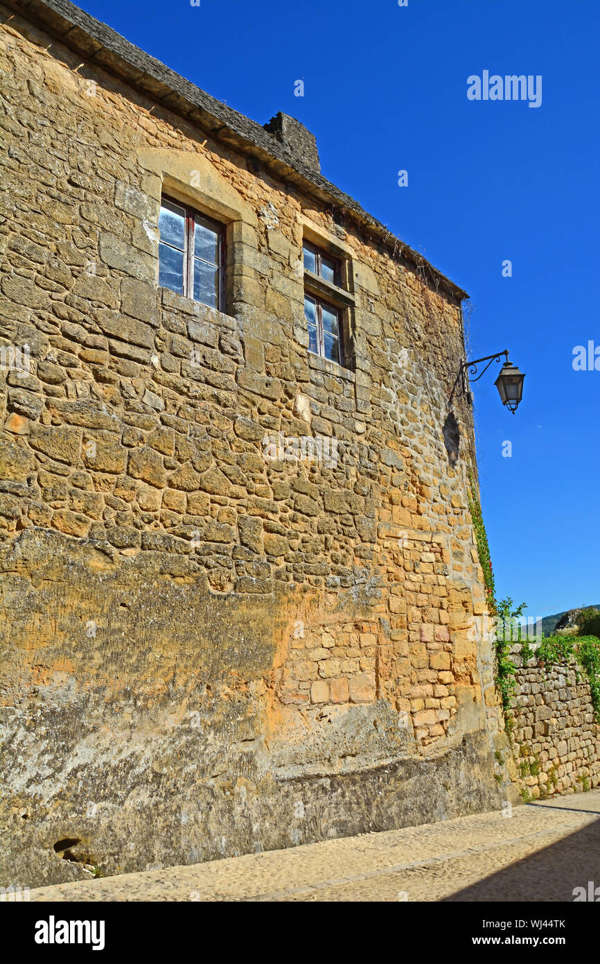 Golden stone walls in the Perigord region of France Stock Photo