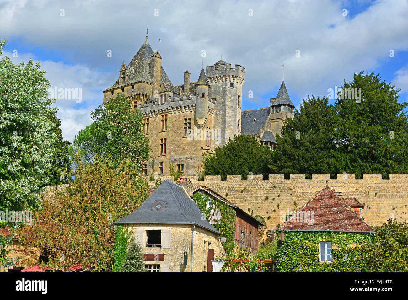 The fortified Chateau Montfort on the Dordogne River in France Stock Photo
