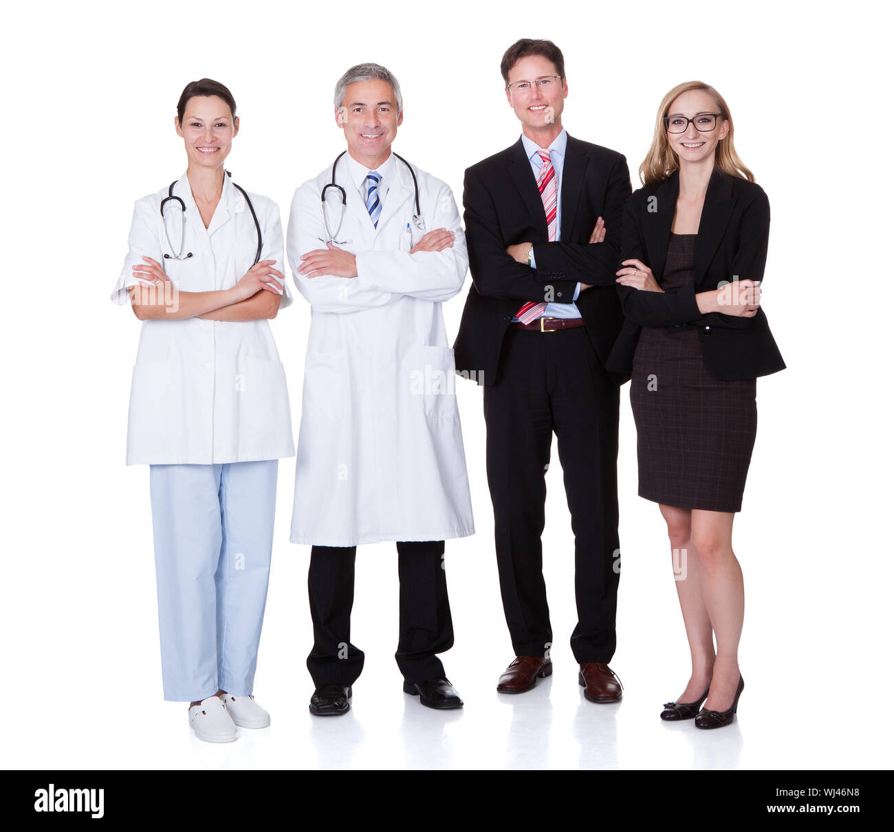 Hospital staff represented by both the medical profession in the form of a doctor and the business administrators Stock Photo