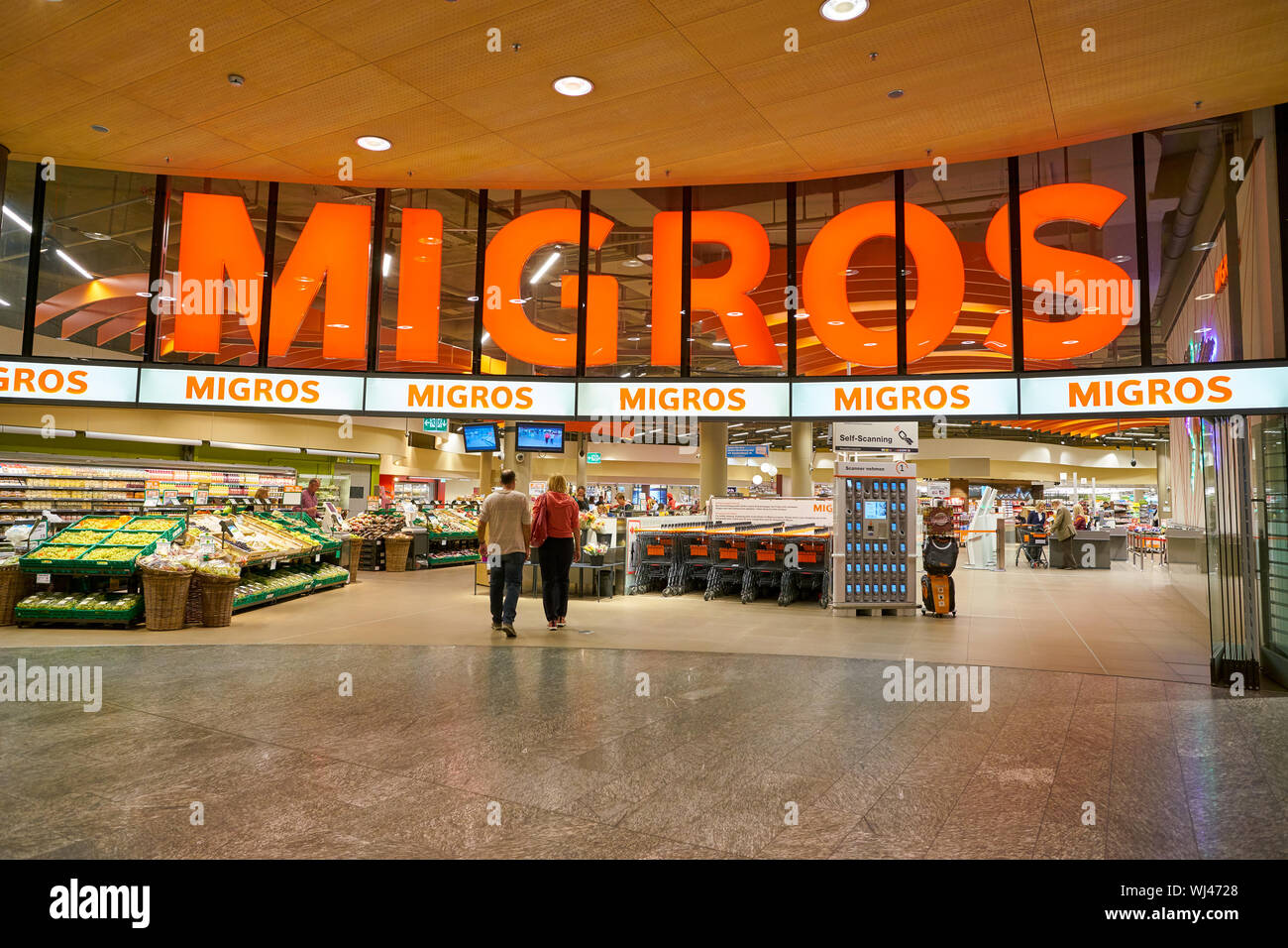 ZURICH, SWITZERLAND - CIRCA OCTOBER, 2018: entrance to Migros supermarket in Zurich International Airport. Migros is Switzerland's largest retail comp Stock Photo