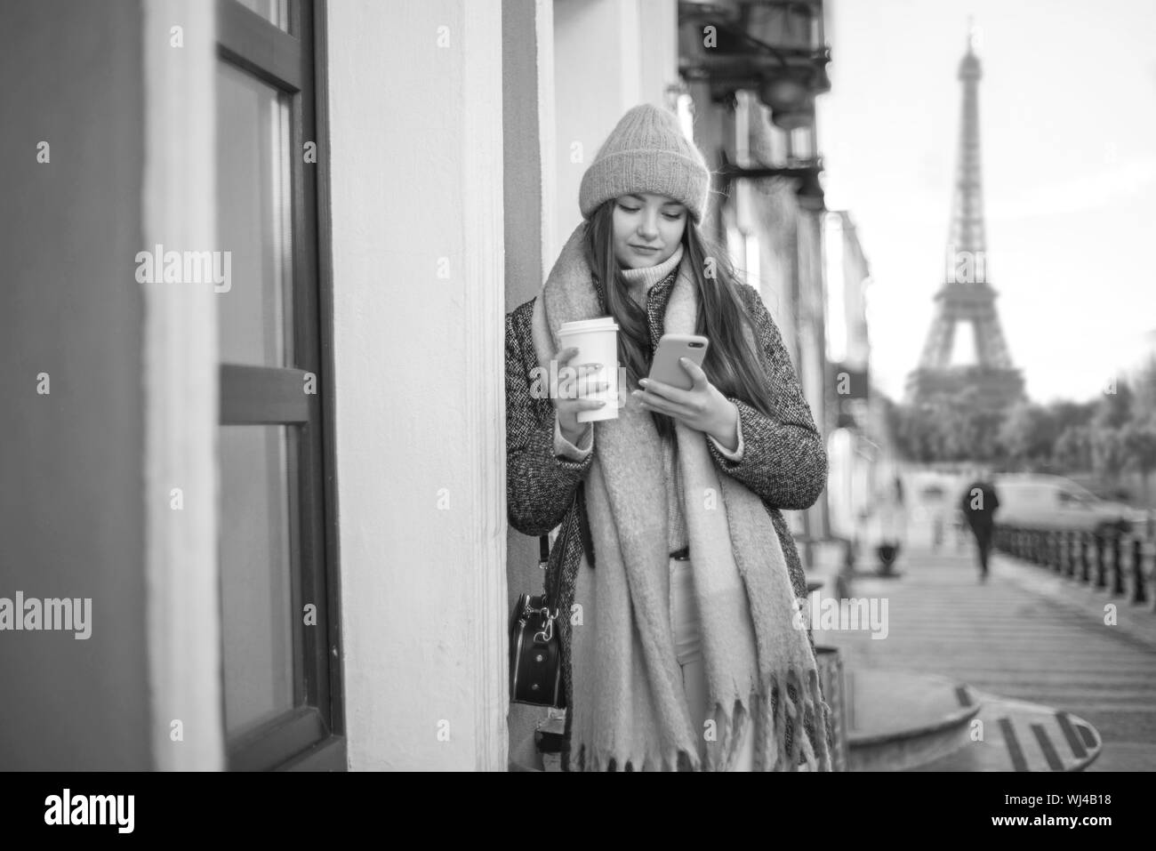 Girl in a coat in Paris. black and white photo Stock Photo