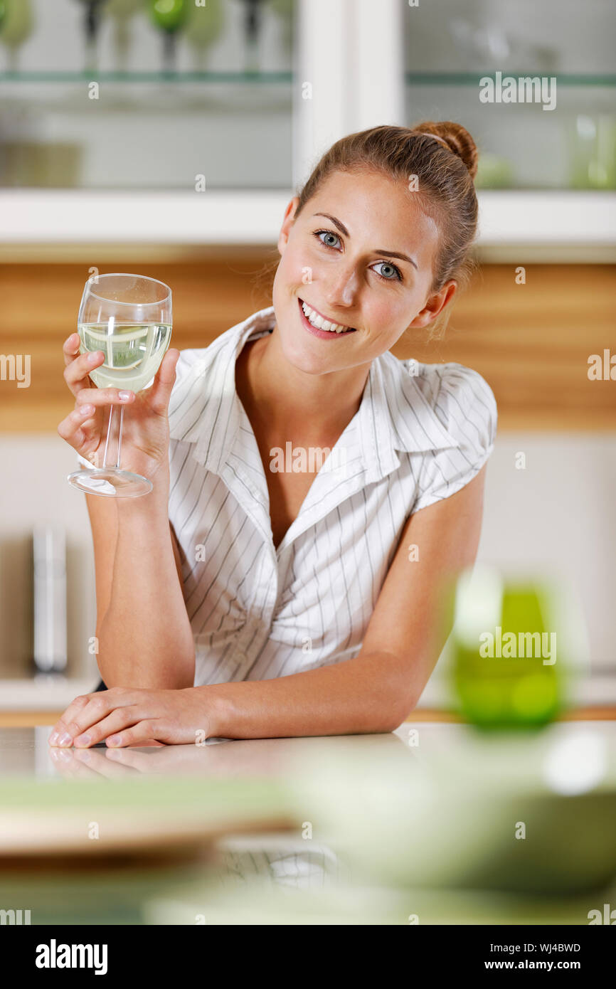 Young business woman relaxing at home with a glass of wine Stock Photo ...