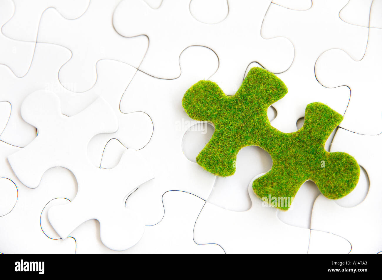 green puzzle piece Stock Photo Alamy