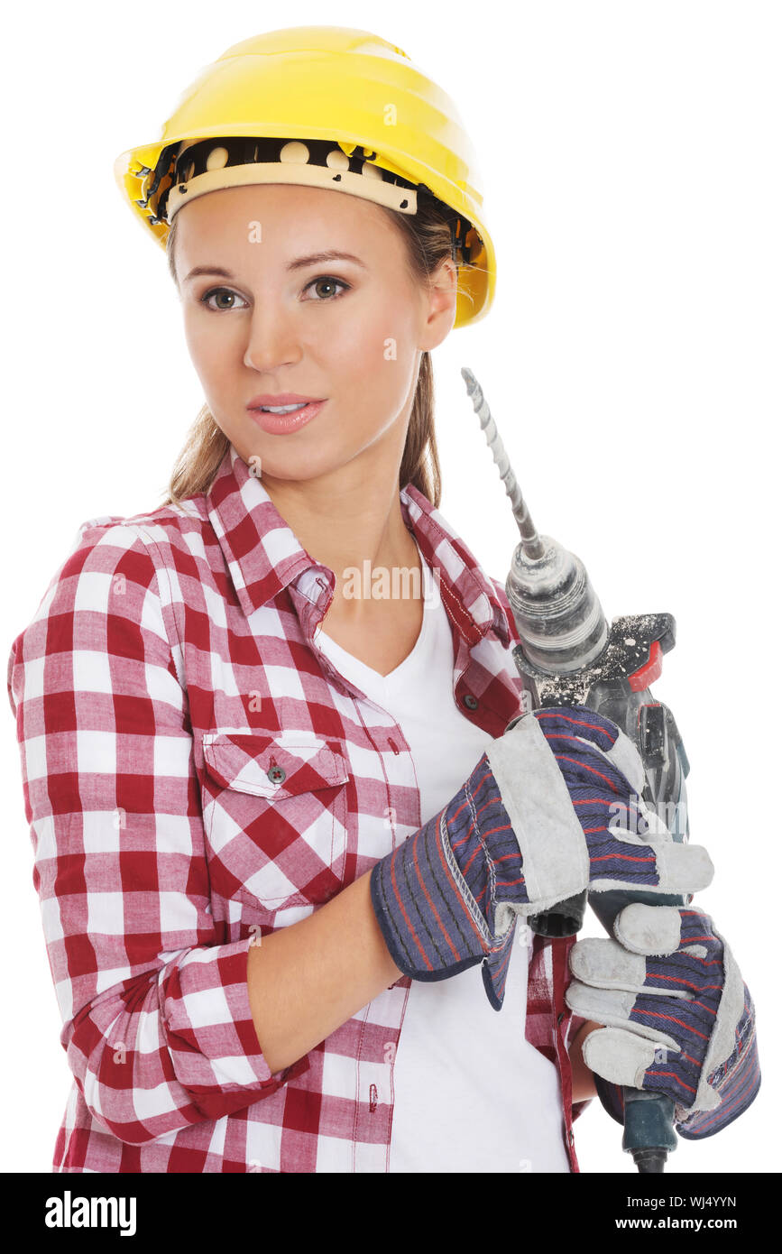 Young woman in protective helmet and jackhammer. Isolated on white. Stock Photo