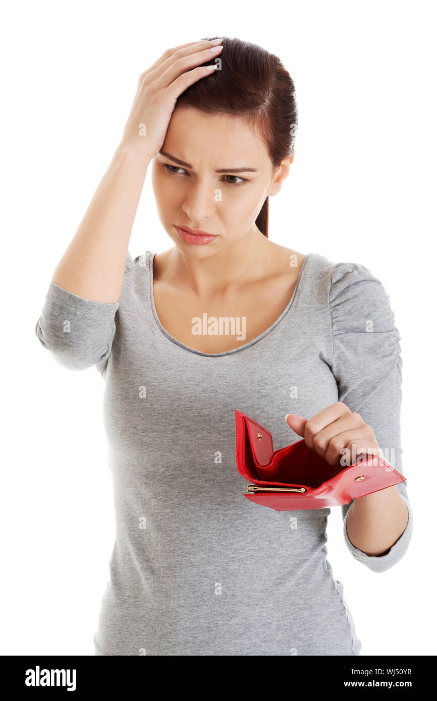 Scared Empty Wallet Beautiful casual woman with empty wallet, worrying. Isolated on white ...