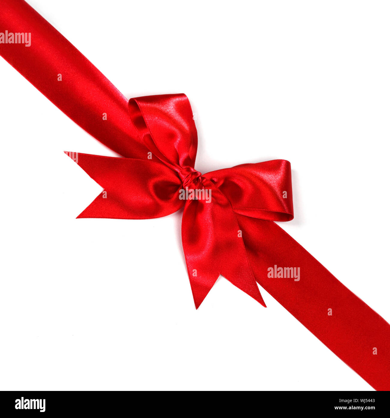 Red ribbon with bow isolated on white background Stock Photo - Alamy