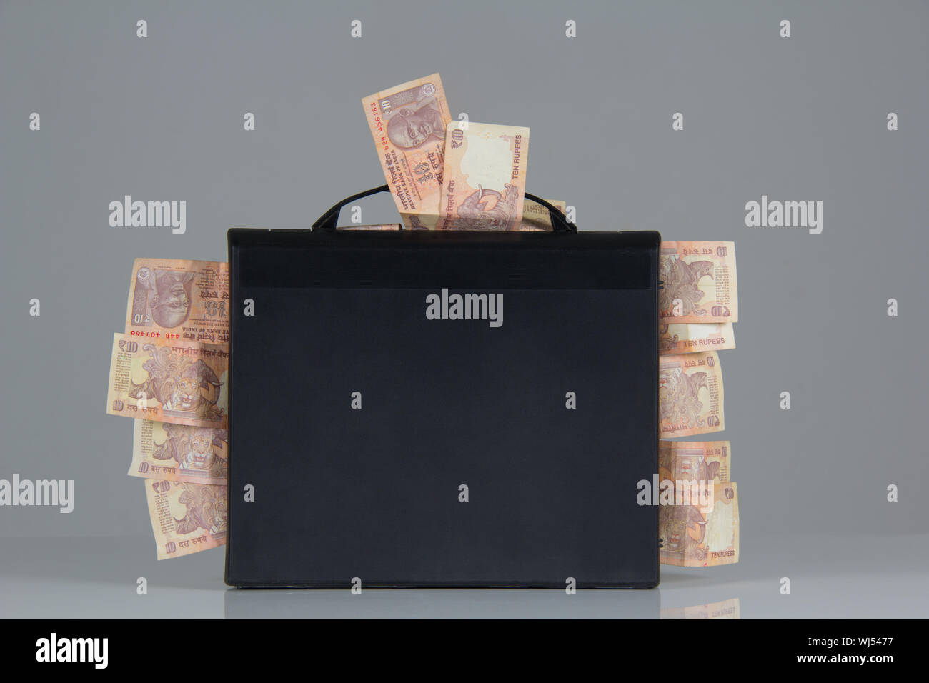 Briefcase full of money Stock Photo Alamy