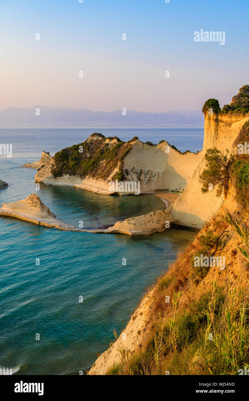 Cape Drastis at sunset close to Peroulades and Sidari village - Beautiful  coast scenery with High cliffs and paradise beach - Corfu, Ionian island,  Gr Stock Photo - Alamy