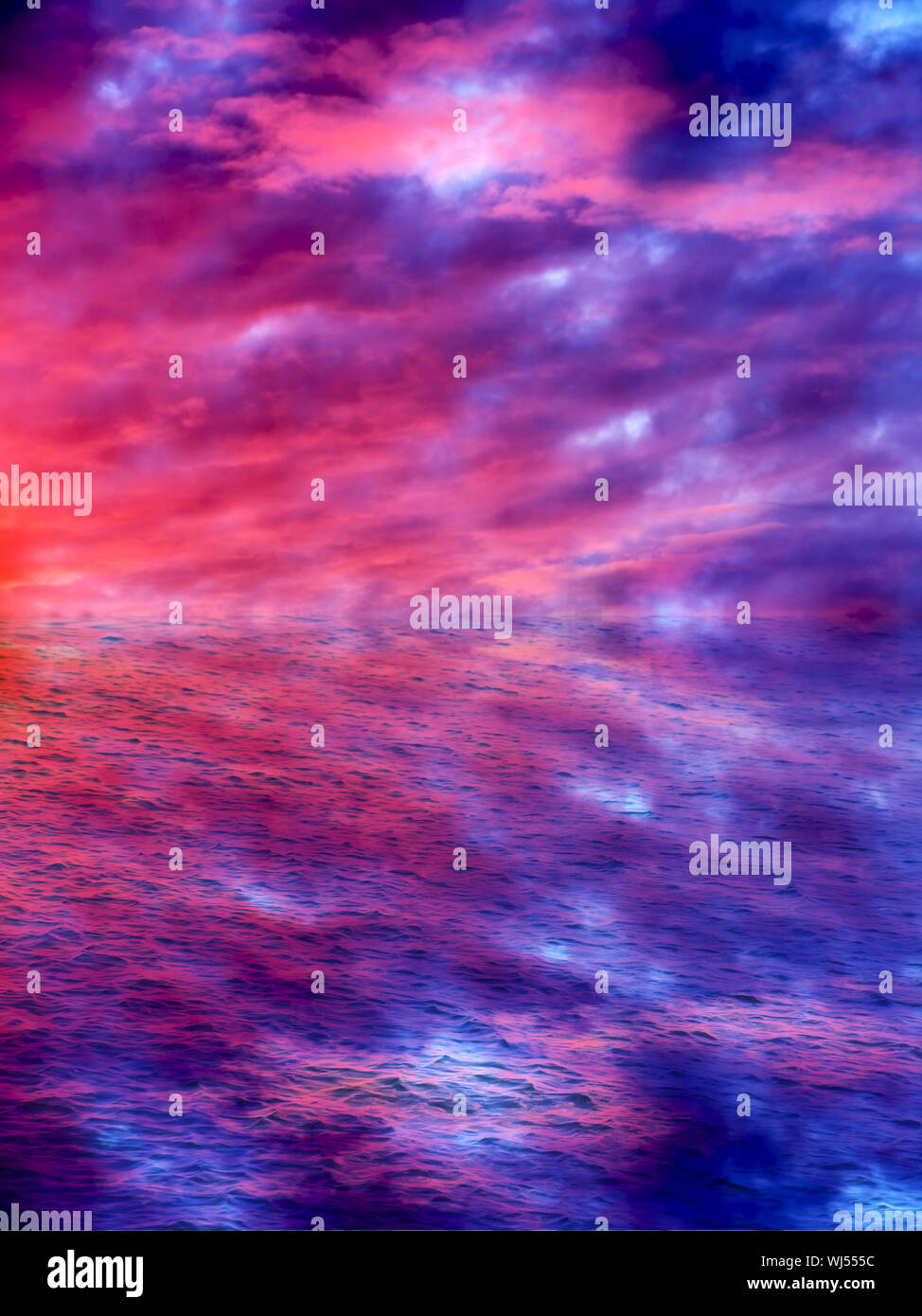 Beautiful Sunset With Clouds All Possible Shades Of Pink And Purple Reflected Over Water With Waves Stock Photo Alamy