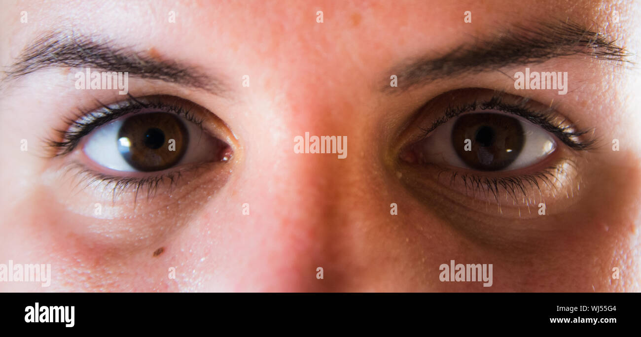 Portrait Of Woman With Brown Eyes Stock Photo