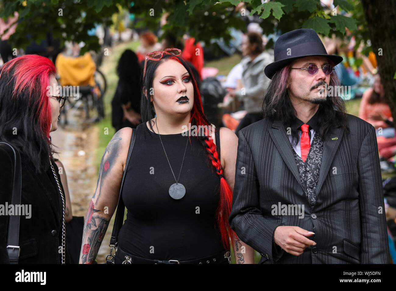 Goth couple at Helsinki Pride after-party in Kaivopuisto Park Stock Photo