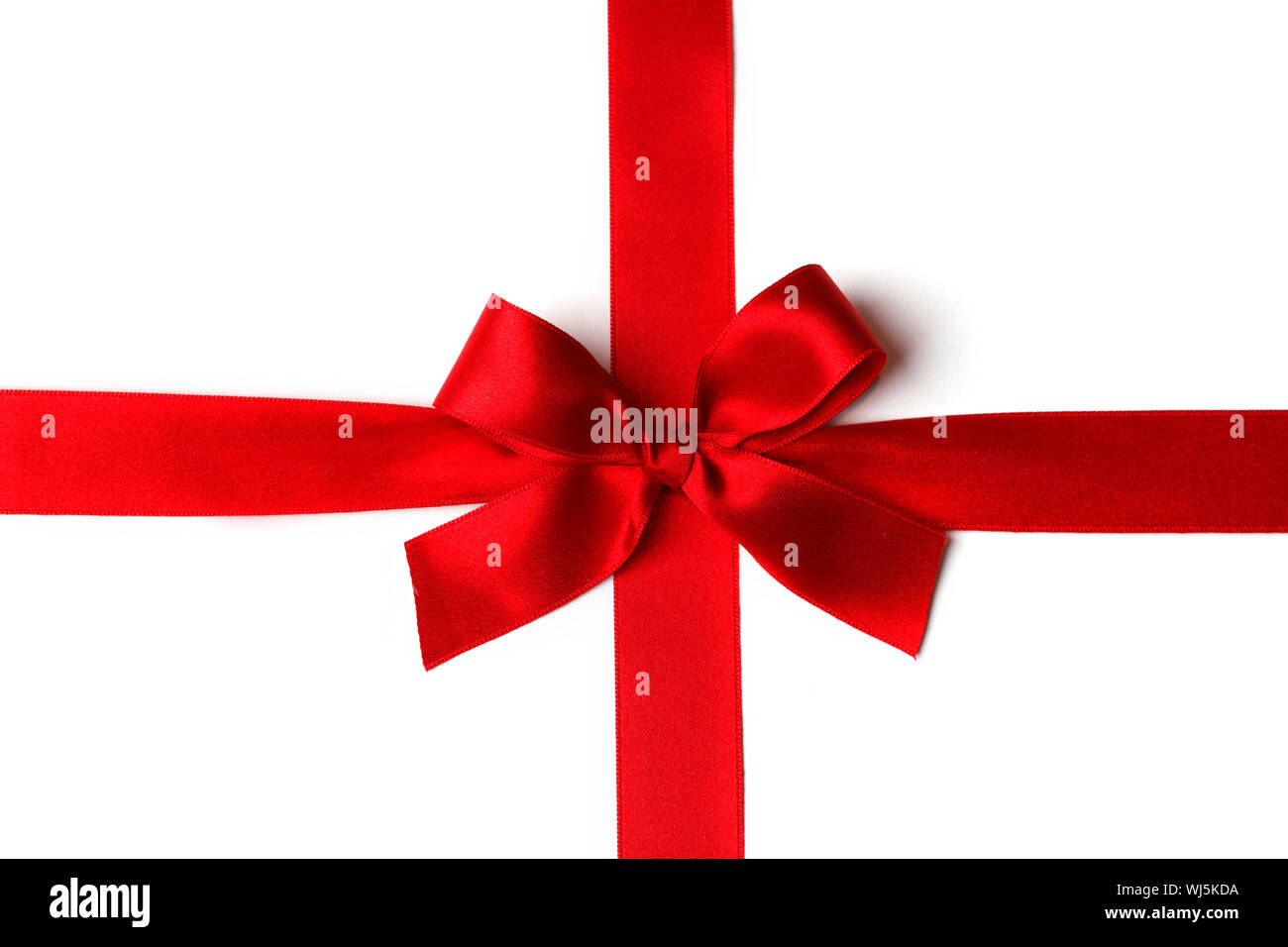 Red ribbon with bow isolated on white background Stock Photo - Alamy