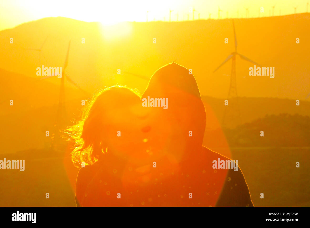 Lady hugging her boyfriend on their day trip in the nature Stock Photo ...