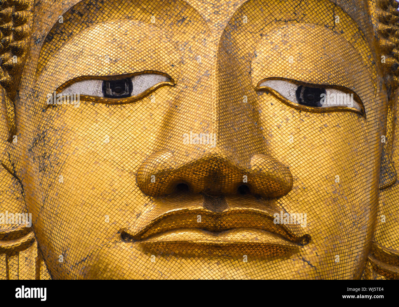 Golden Buddha statue at buddhist temple in Bangkok Stock Photo - Alamy