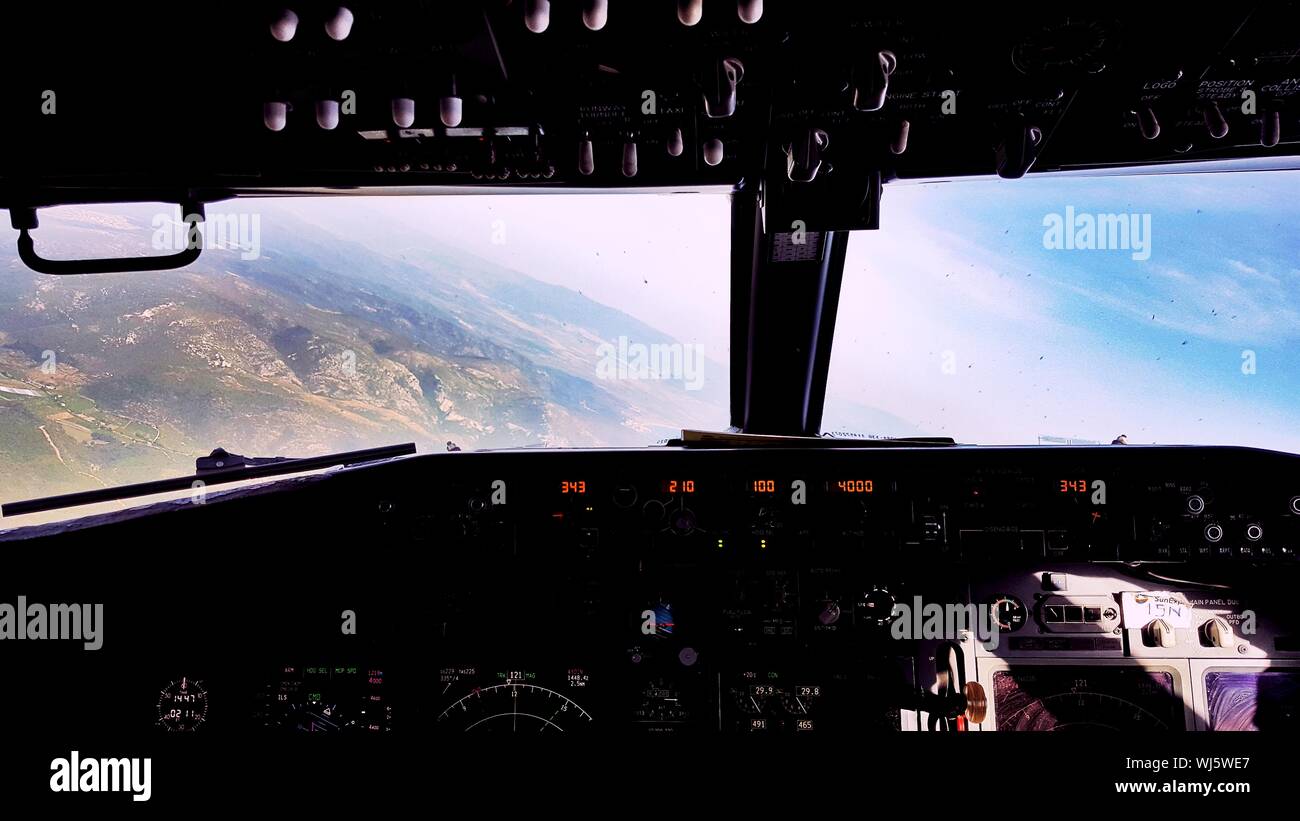 Landscape Shot Through Airplane Cockpit Stock Photo