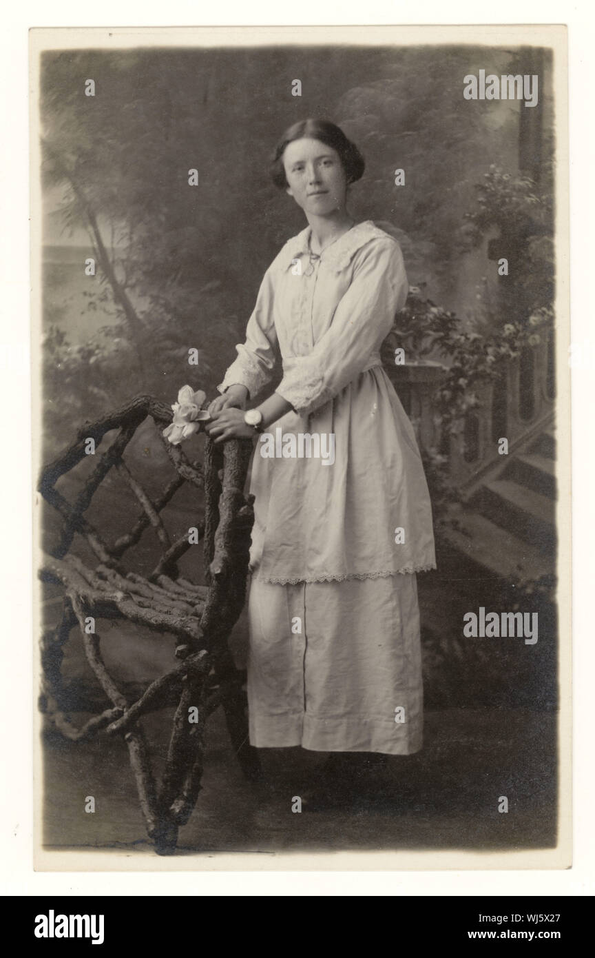 Early 1900's WW1 era studio portrait postcard of young woman from studio of Horace Dudley, W. Midlands, England, U.K. circa 1916,1917 Stock Photo