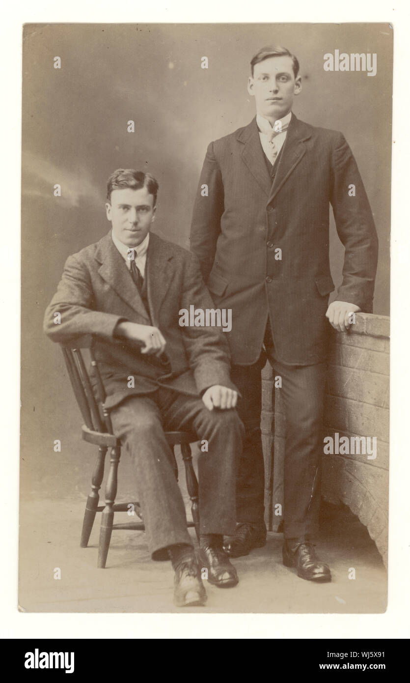 Early 1900's studio portrait postcard of young men, Mr. Clark and Mr. Nelson, dated 1914, U.K. Stock Photo