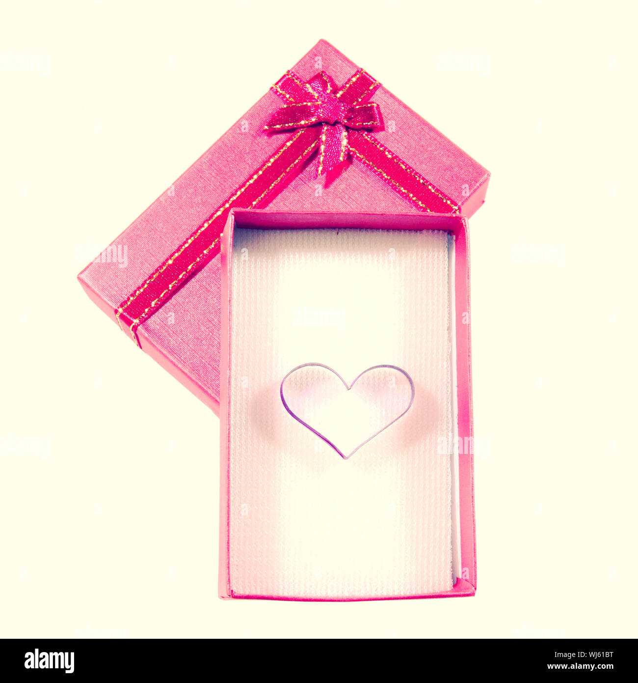 Heart shape in red box isolated with retro filter effect Stock Photo ...