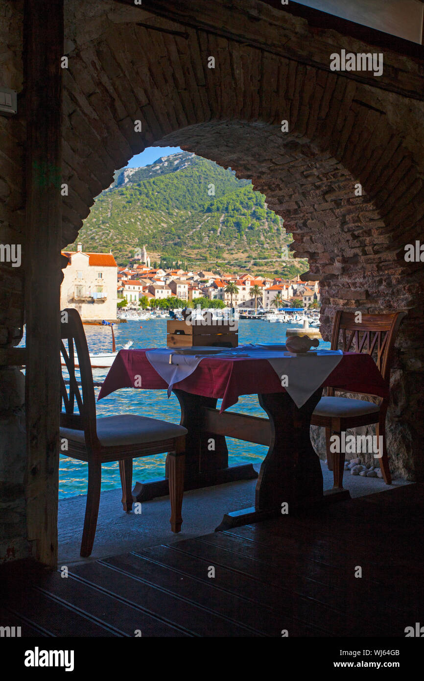 Restaurant Jastozera on waterfront, Komiza, Vis island, Croatia. Location  used in Mamma Mia 2 movie (2018 Stock Photo - Alamy