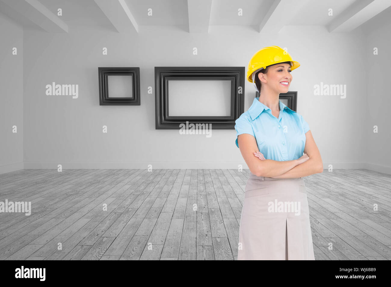 Composite image of smiling attractive architect posing Stock Photo