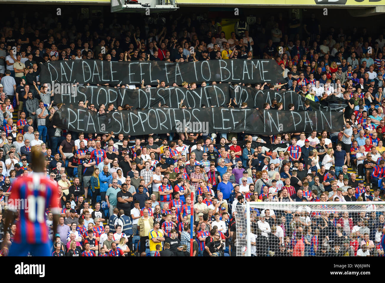 Crystal Palace fans with a protest about what happened to Bury FC during the Premier League match between Crystal Palace and Aston Villa at Selhurst Park , London , 31 August 2019  Photo Simon Dack/Telephoto Images. Editorial use only. No merchandising. For Football images FA and Premier League restrictions apply inc. no internet/mobile usage without FAPL license - for details contact Football Dataco Stock Photo