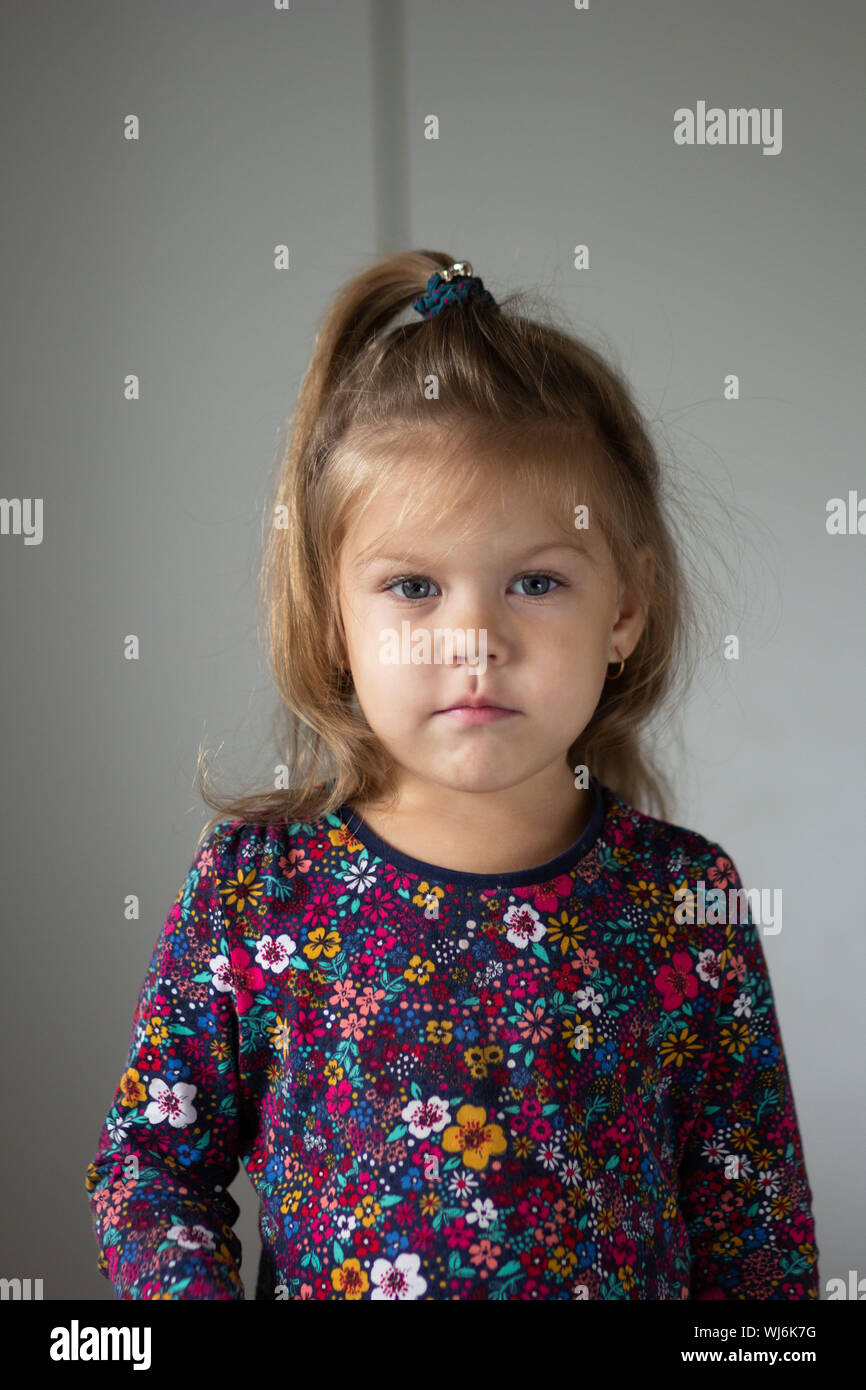 Portrait of cute little girl on white background Stock Photo - Alamy