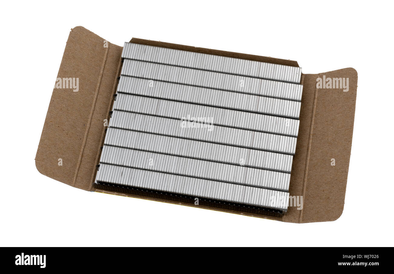 Several rows of industrial steel staples in an open cardboard box