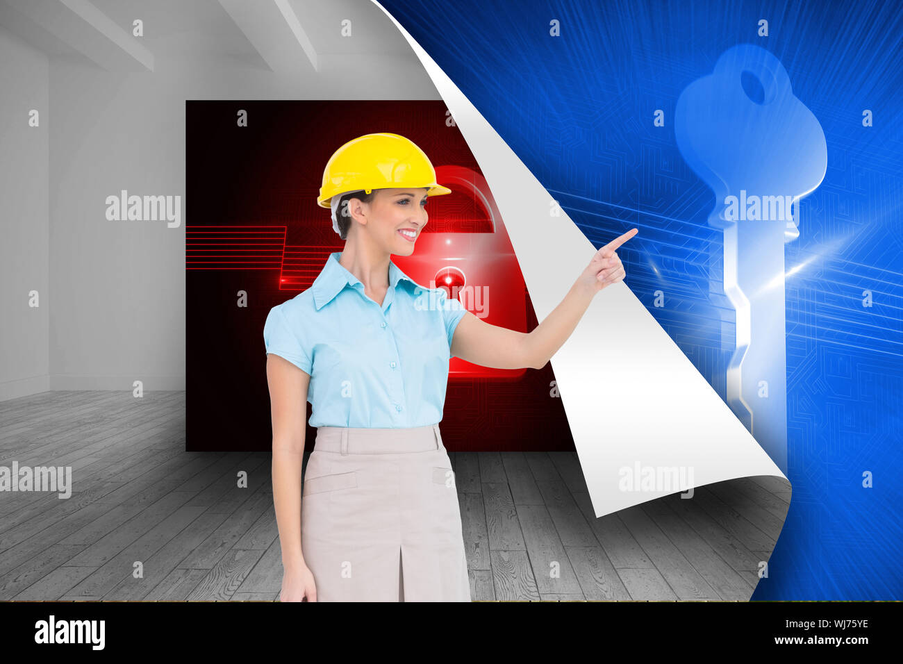 Composite image of smiling attractive architect pointing Stock Photo