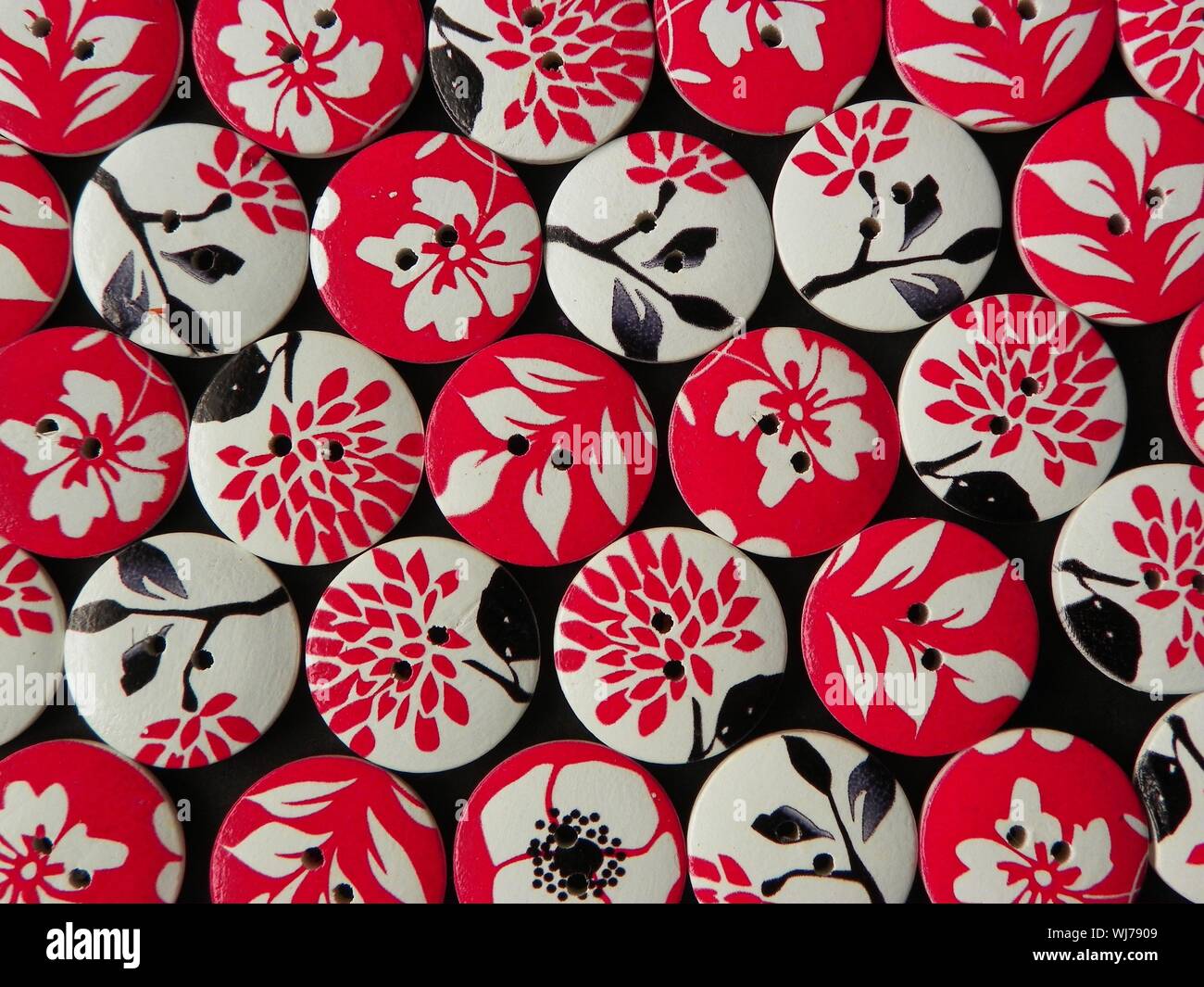 Full Frame View Of Circular Buttons With Floral Pattern Stock Photo