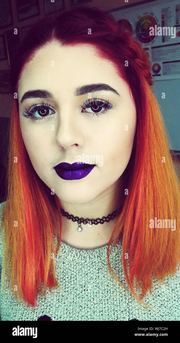 Close-up Portrait Of Redhead Woman With Purple Lipstick Stock Photo - Alamy