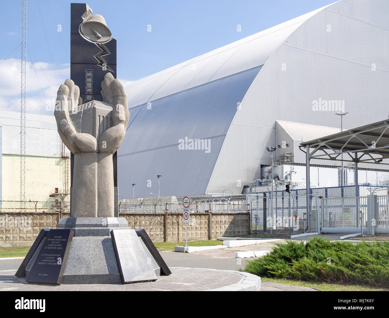 PRIPYAT, UKRAINE-AUGUST 20, 2019: Chernobyl Sarcophagus Memorial next to the reactor 4 of the Chernobyl nuclear power plant Stock Photo