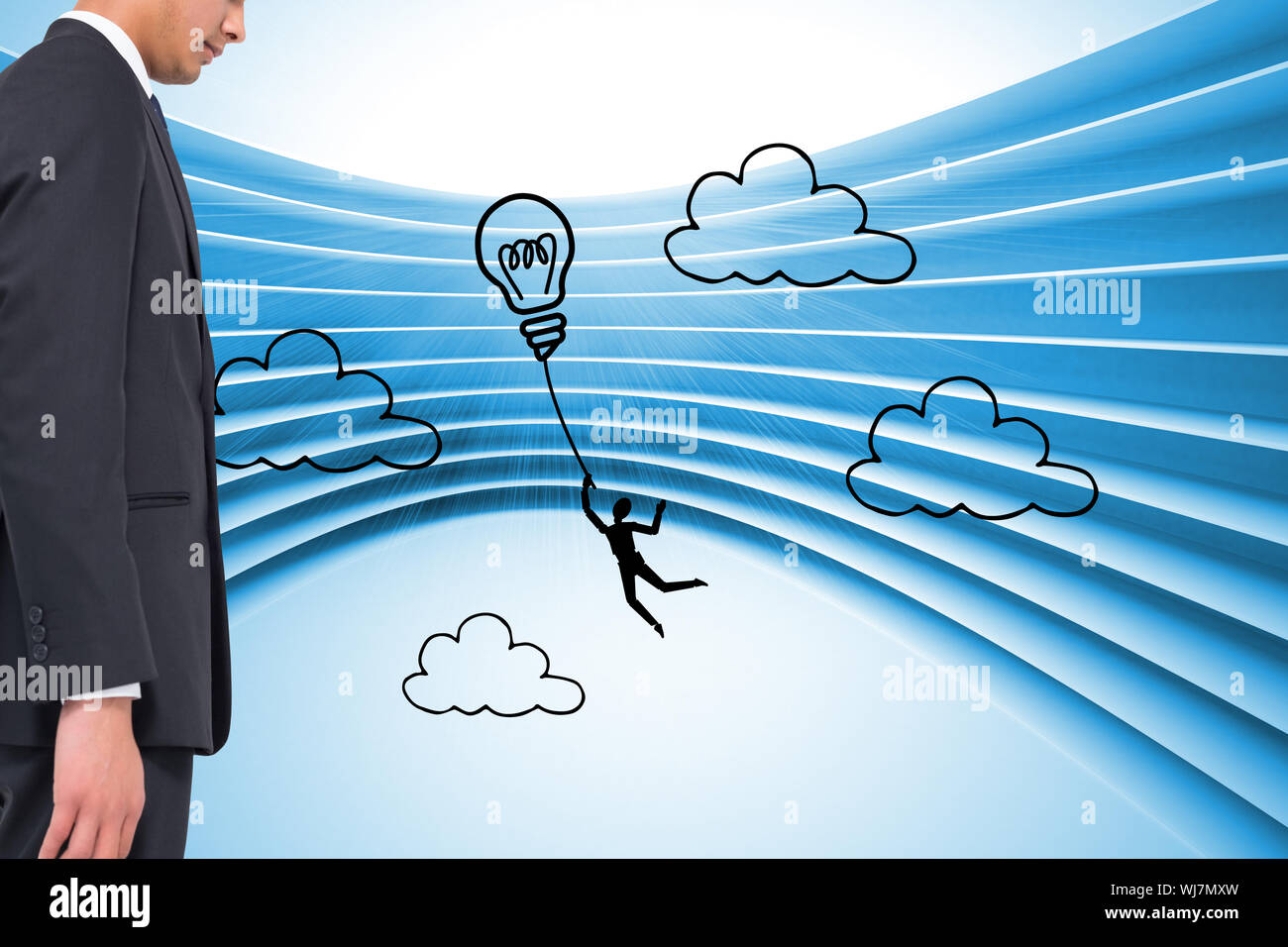 Composite image of light bulb graphic on futuristic blue background Stock Photo
