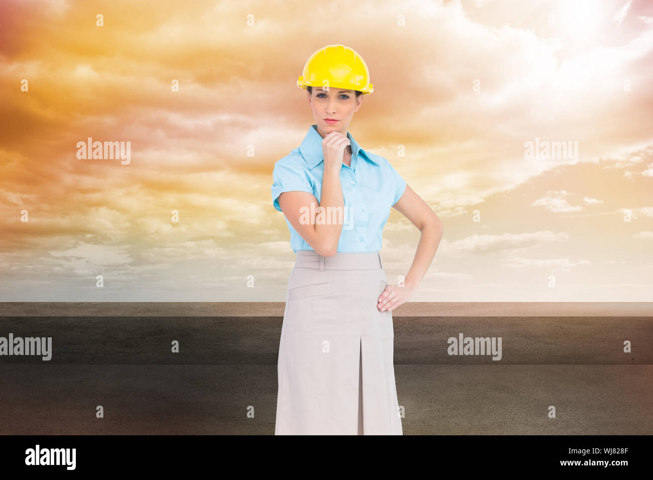 Composite image of thoughtful attractive architect posing Stock Photo