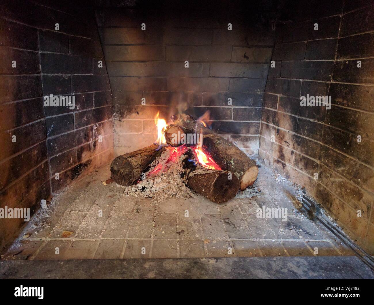 Wood Burning At Fire Place Stock Photo