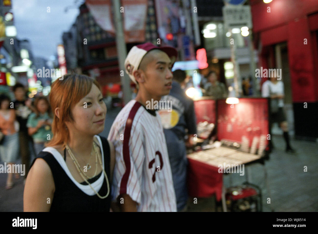 A Japanese couple shopping in the Shibuya Distric, Tokyo, Japan. Stock Photo