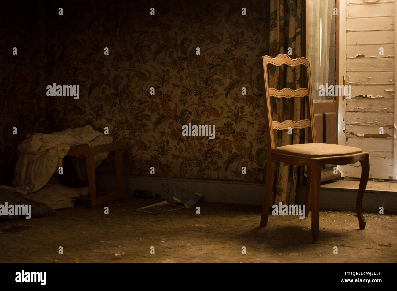 Empty Chair In Abandoned Room Stock Photo Alamy