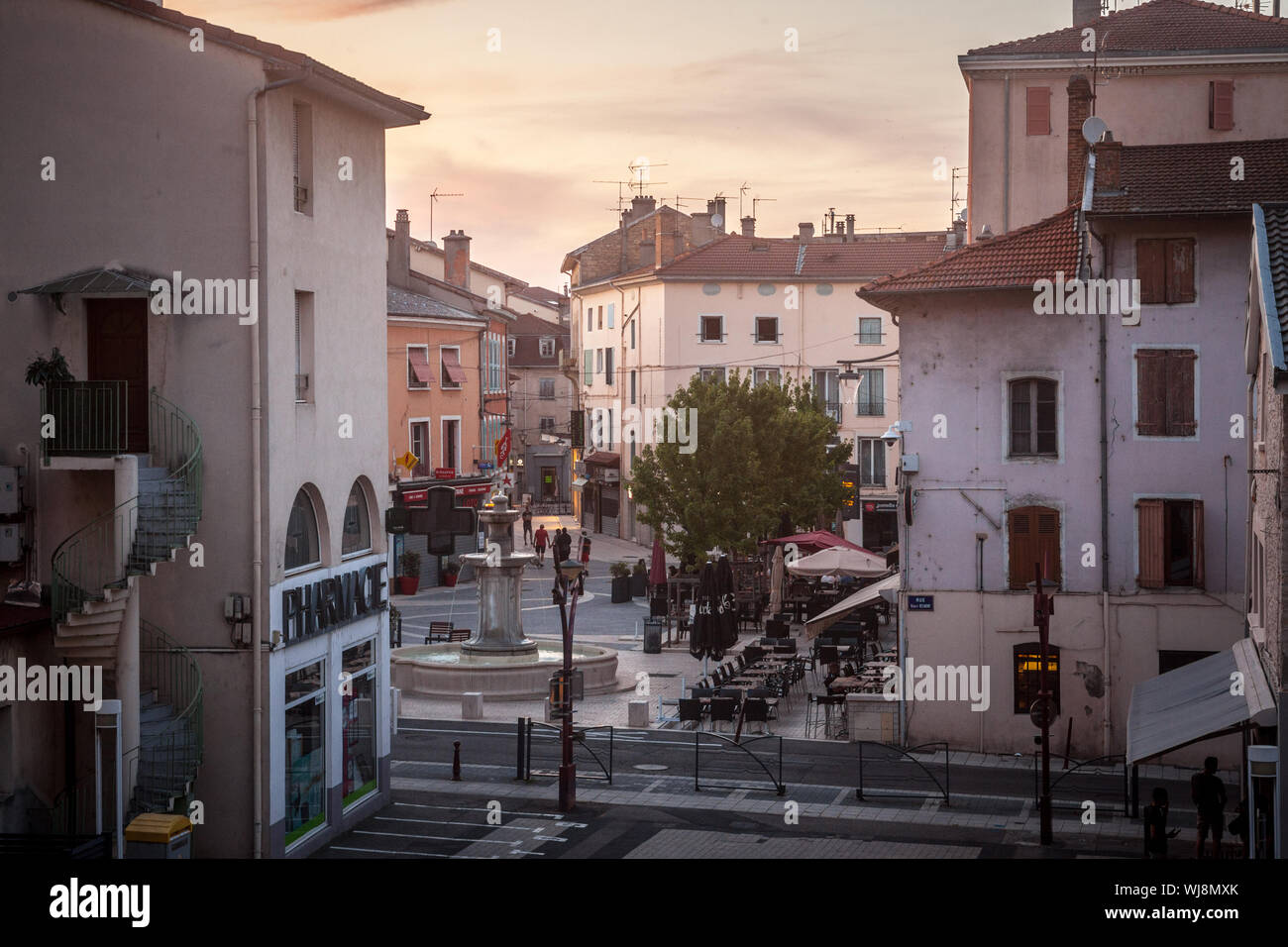 BOURGOIN-JALLIEU, FRANCE - JULY 16, 2019: Place du 23 Aout 1944 Square, a pedestrian square with cafes and bars, in the center of Bourgoin, a typical Stock Photo