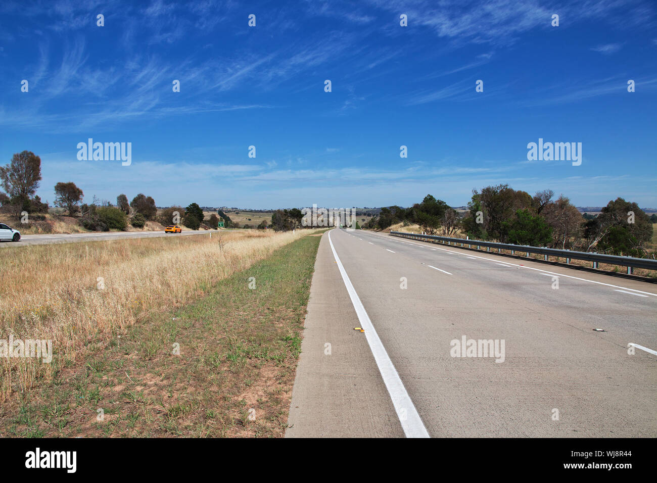 The road is in a rural location, Australia Stock Photo - Alamy