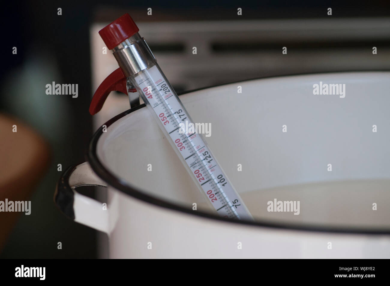 Close Up Of Thermometer In Cup Stock Photo - Alamy