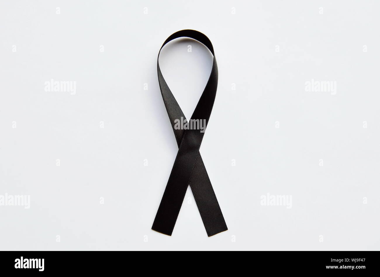 mourning ribbon on white background Stock Photo - Alamy