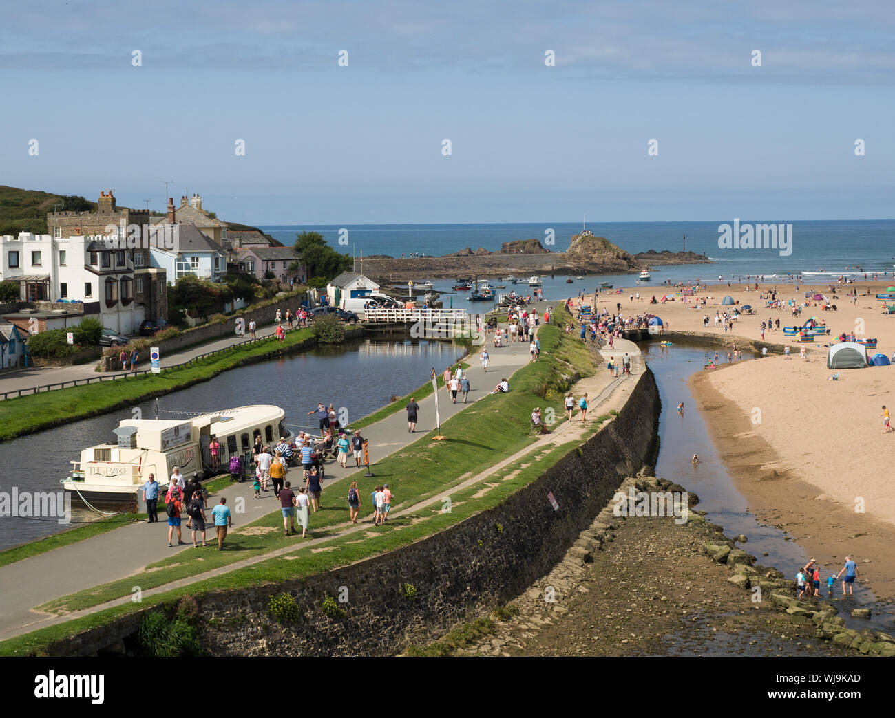 Bude canal with Barge restaurant and Summerleaze beach, Bude, Cornwall