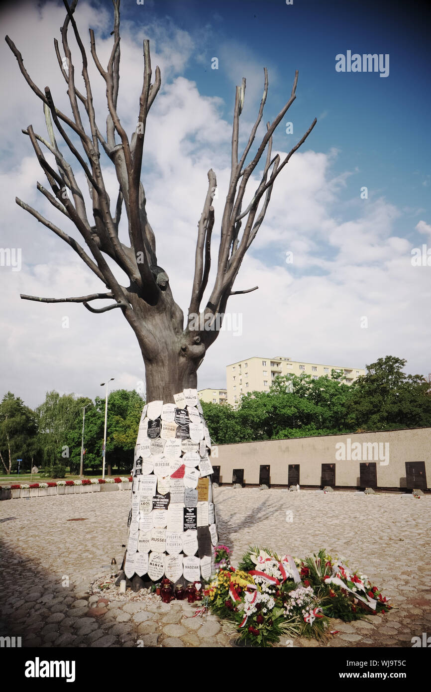 Warsaw Poland - Pawiak prison with a memorial tree to the victims of German Nazis terror and torture during WW2 Stock Photo