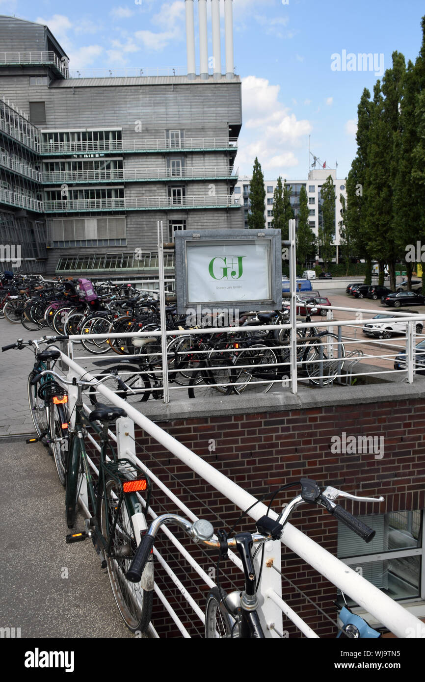 Commuters' cycles outside the Gruner & Jahr publishing HQ offices, Hamburg, Germany Aug 2019 Stock Photo