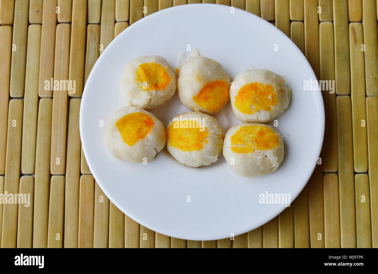 Chinese Cake Filling Sweet Bean And Salty Egg Yolk On Dish Stock Photo Alamy