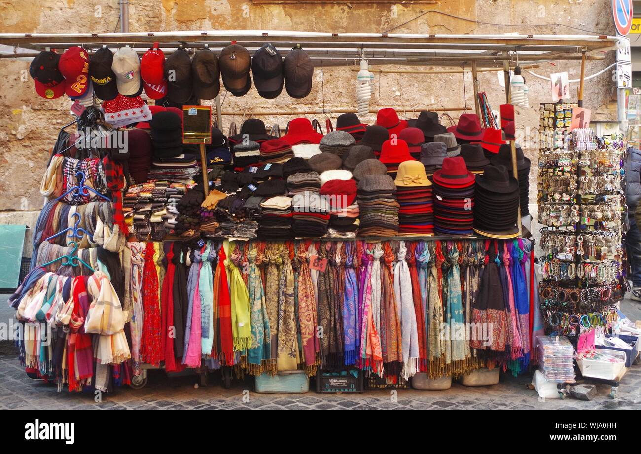 Colorful Hats And Scarves For Sale At Market Stock Photo