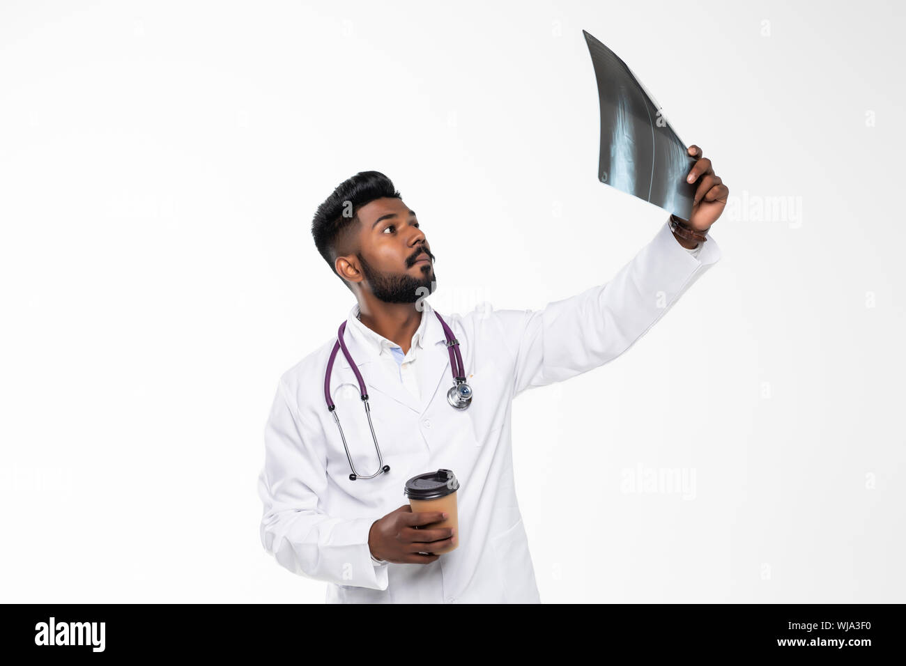 Serious young latin doctor hi-res stock photography and images - Alamy